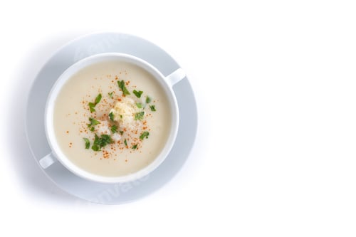 Preview: Cauliflower soup isolated on white background.