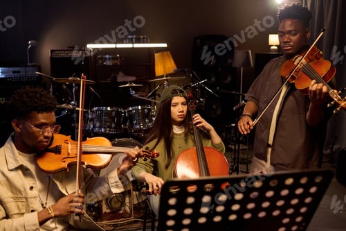 Preview: Multiethnic Young Adult Musicians Rehearsing Classical Music in Studio
