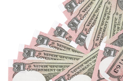 Preview: 1 Indian rupee bills lies in different order isolated on white
