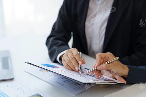Preview: Two of business woman at meeting assessment the state of business investment and marketing in office