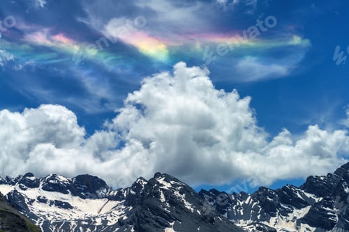 Preview: Iridescent cloud over the road to Stelvio pass (Lombardy) at summer