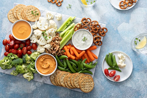 Preview: Plant based snack board with vegetables and crackers