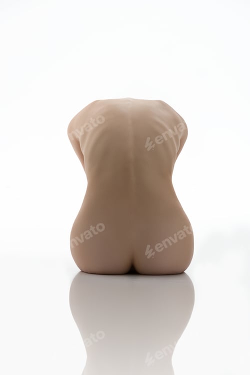 Preview: Back view of a naked woman sitting