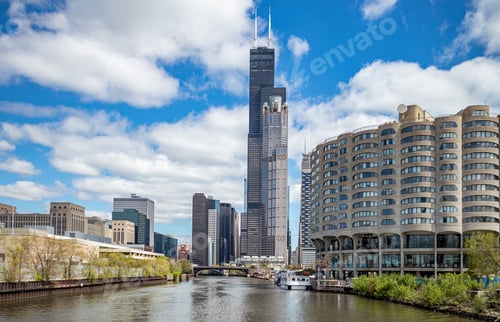 Preview: Chicago city skyscrapers on the river canal, blue sky background