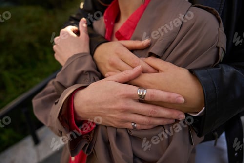 Preview: Woman hugs her girlfriend from the back