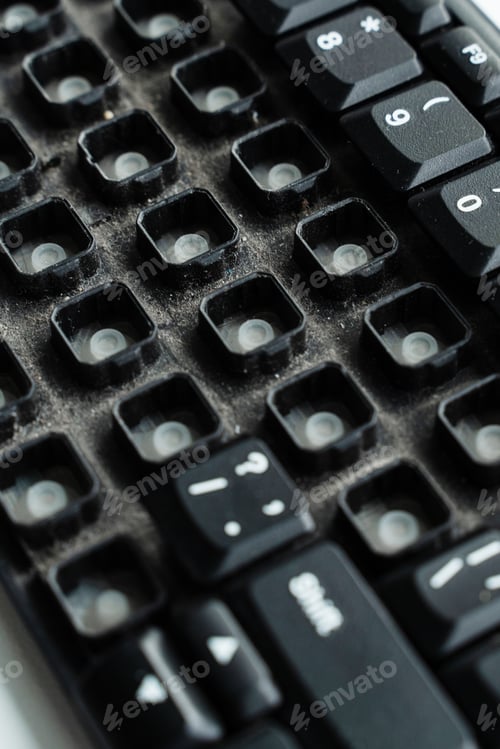 Preview: Close-Up of Old Dusty Keyboard with Missing Keys
