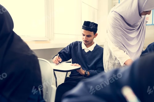Preview: diverse muslim children studying in classroom
