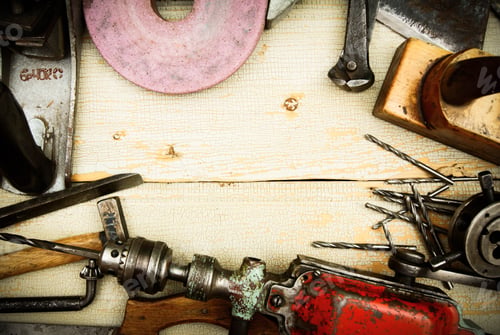 Preview: Vintage working tools on wooden background.