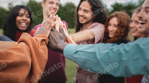 Preview: Diverse group celebrating unity outdoors authentic multiethnic team sharing joy and connection