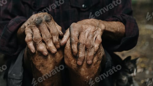 Preview: Male wrinkled hands, old man is wearing