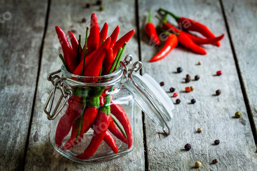 Preview: red hot chili pepper in a glass jar