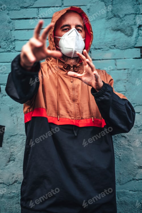 Preview: A young Caucasian man with a mask on one of his first walks