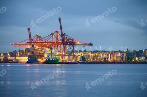 Preview: International cargo ship with containers cargo illumination and gantry cranes at port