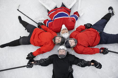 Preview: All Female Hockey Team Lying on Ice