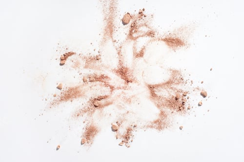 Preview: Smudges of powder foundation on white background