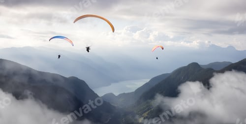 Preview: Adventure Composite Image of Paraglider Flying up high in the valley near Mountains
