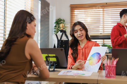 Preview: Fashion designers discussing color palette options for new collection