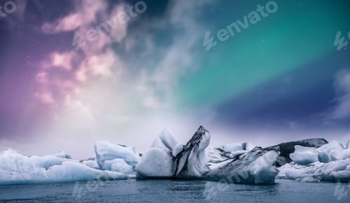 Preview: Northern lights aurora borealis over Jokulsarlon glacier ice lagoon in Iceland