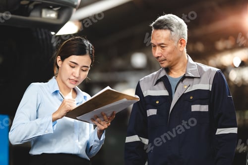 Preview: customer making inspection check to a car engine repair occupation job at garage service