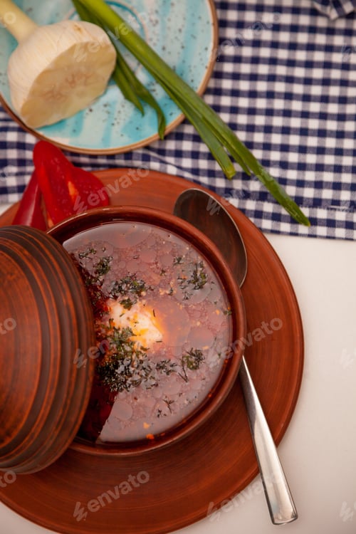 Preview: Ukrainian red borsch with sour cream, garlic and green onions. First course. Dinner. A traditional