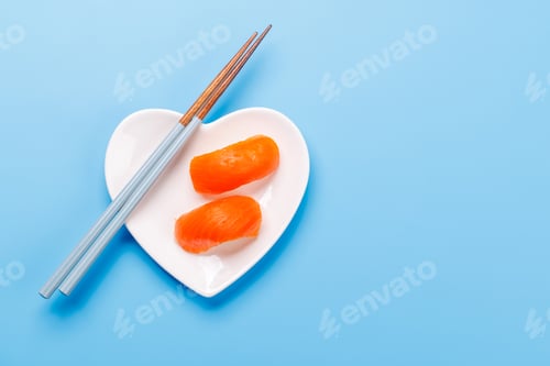 Preview: A heart-shaped plate filled with delicious sushi, accompanied by chopsticks