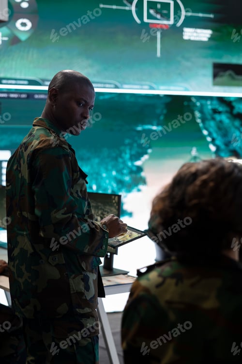 Preview: Infantry unit trooper studying the reconnaissance activity in control center