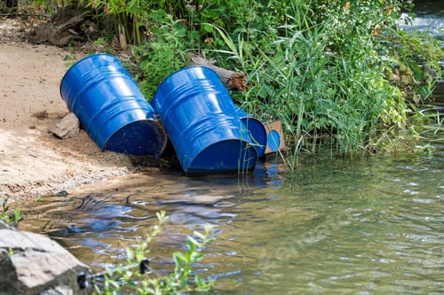 Preview: blue oil drums thrown in the water
