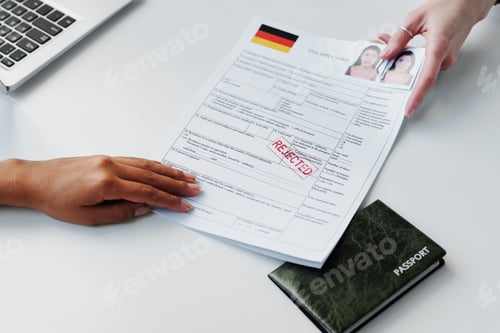 Preview: Returning Documents To Woman At Table