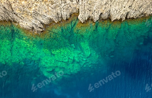 Preview: Drone view rocky sea coast with transparent turquoise water. Seascape top view, Kefalonia
