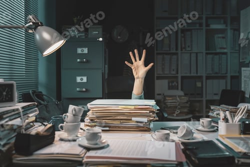 Preview: Office worker overwhelmed with paperwork