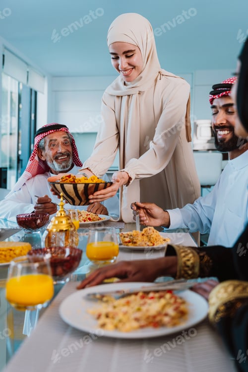 Preview: Arab family enjoying traditional meal together during ramadan