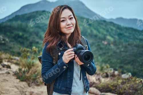 Smiling asian women is ready to make a photo shoot