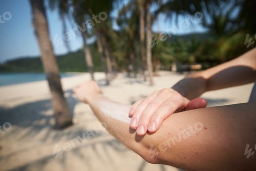 Preview: Close-up of hand while applying sunscreen