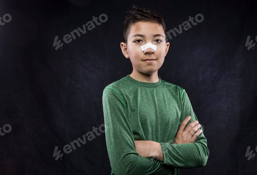 Preview: Confident boy in studio portrait.