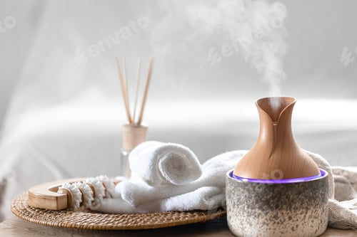 Preview: Essential oil aroma diffuser humidifier diffusing water articles in the air.