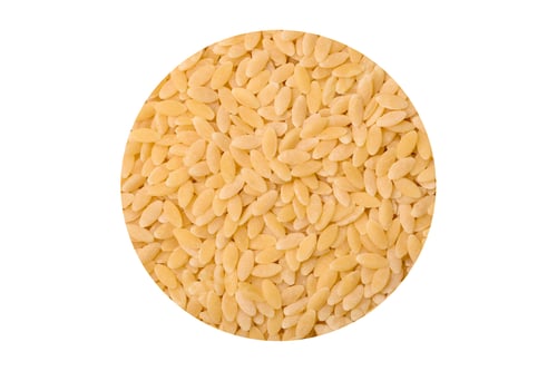 Preview: Raw risoni pasta made from durum wheat on a dark concrete background