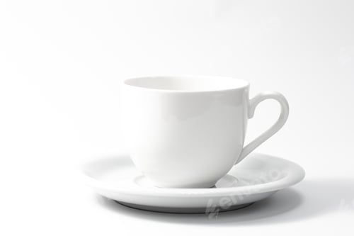 Preview: White cup and saucer isolated on white background.