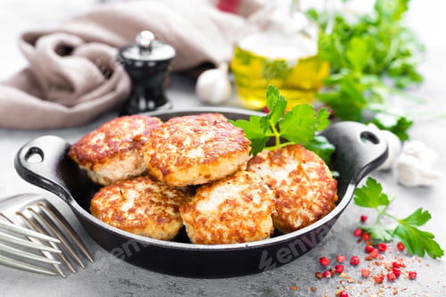 Preview: Cutlets. Fried cutlets in cast-iron pan on table