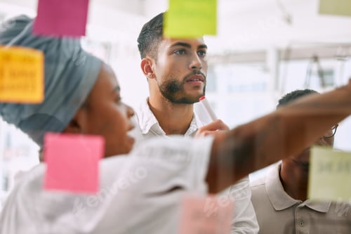 Preview: focused on the plan. Shot of businesspeople having a meeting in a boardroom at work.