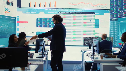 Preview: Financial manager briefing his team members about new corporation objectives