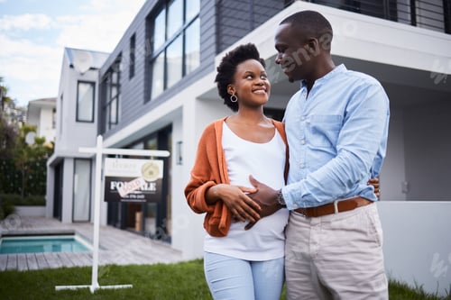 Preview: Upsizing their residence and family. Portrait of a young couple standing outside their new home.