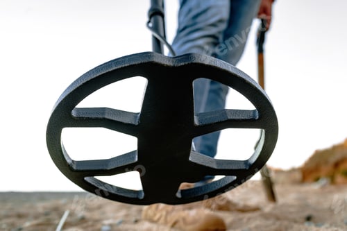 Preview: Metal detector coil in action above the ground