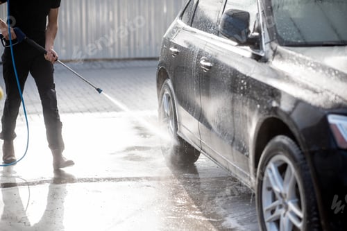Preview: Close-up of a car during the washing process