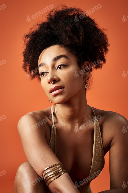 Preview: Vibrant Afro Beauty on Orange Canvas