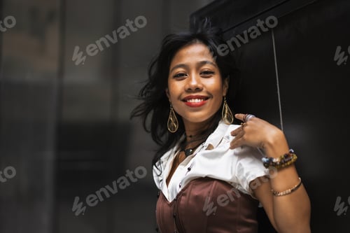 Preview: An Asian girl in a vintage Asian traditional long dress, fashion photography on a black background