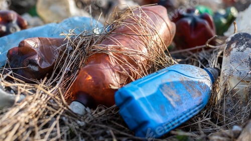 Preview: Ground littered with plastic bottles
