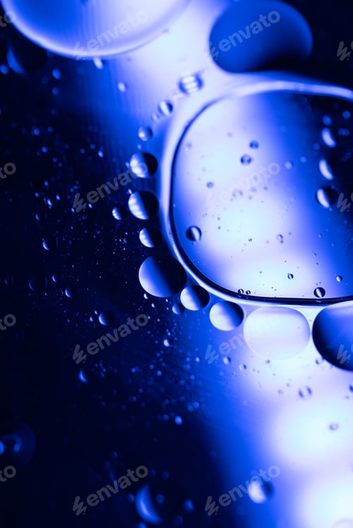 Preview: Beautiful abstraction of liquid colors gently blending together in slow mixing flow