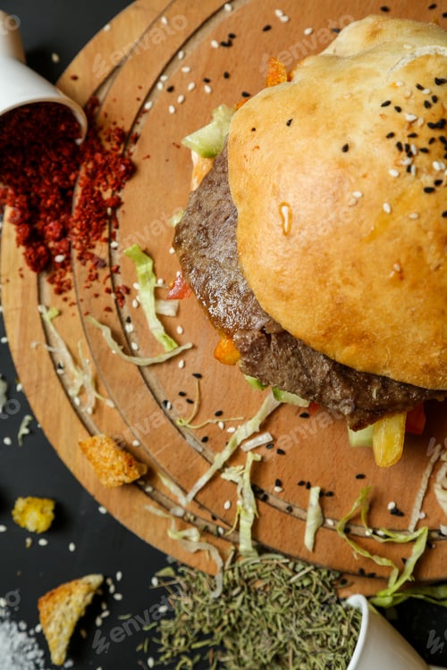 Preview: meat doner with side dried herbs and red pepper close-up view