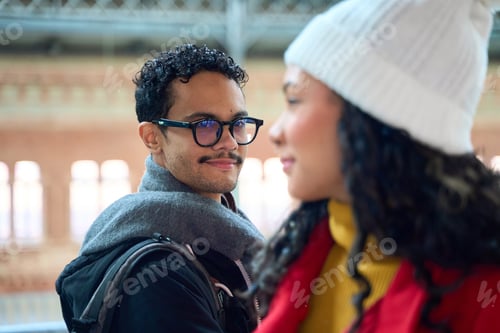 Preview: Young tourist couple sharing a romantic moment at the station