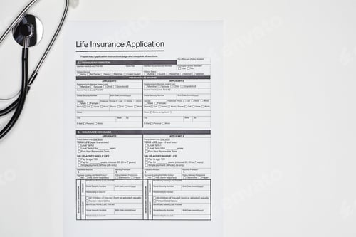 Preview: Overhead shot of an individual medical health insurance policy document and stethoscope